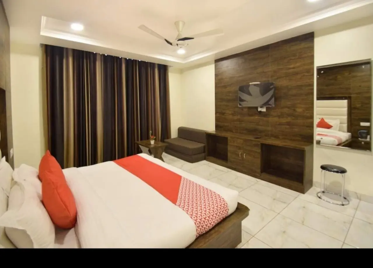 Room with striped curtains and seating