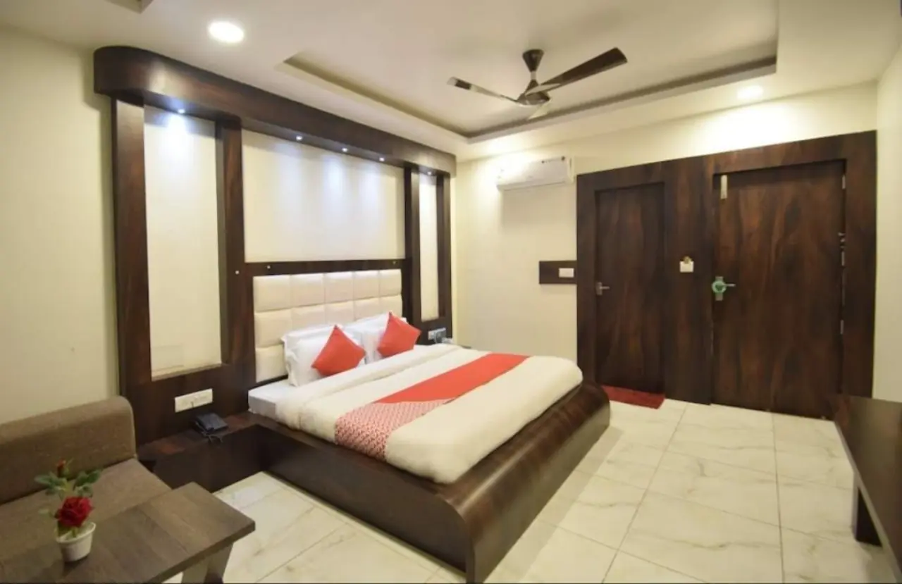 Room with double dark wood doors